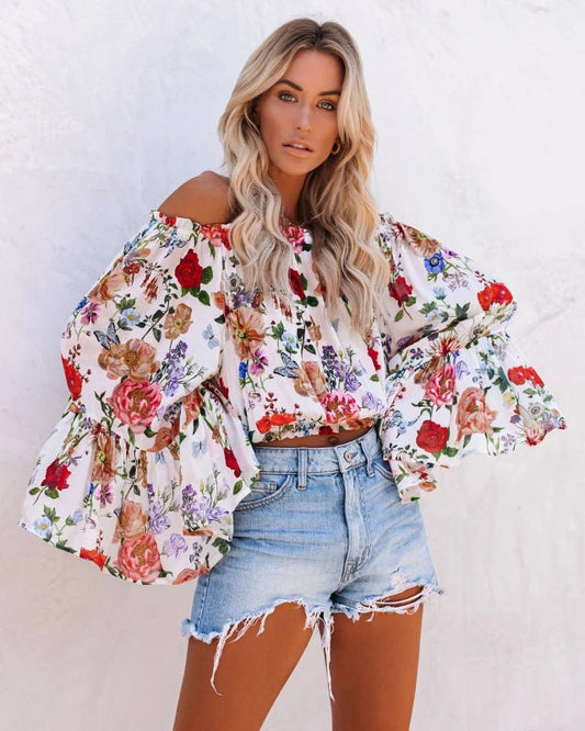 Off-the-shoulder bell sleeve floral crop top